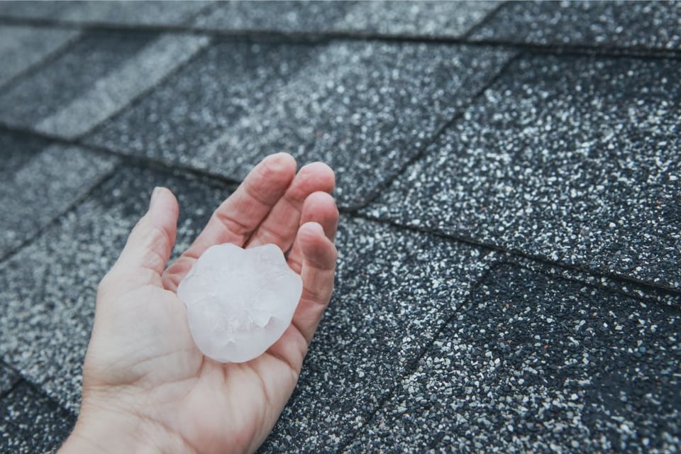 hail storm damage on roof-min